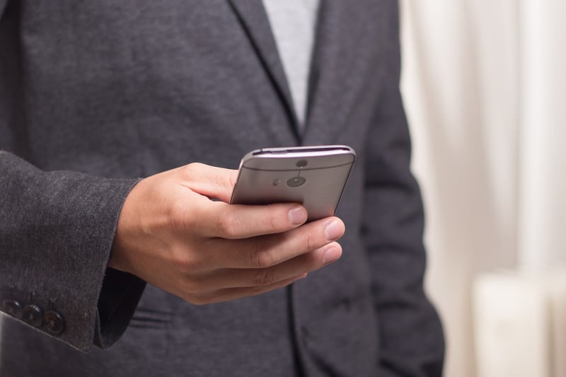 Business Woman Using Smartphone